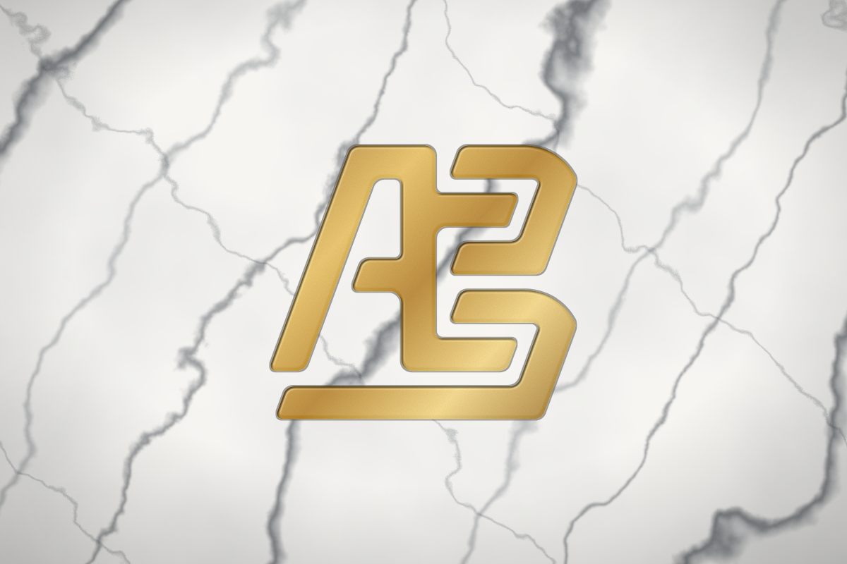 Logo dorado sobre mármol